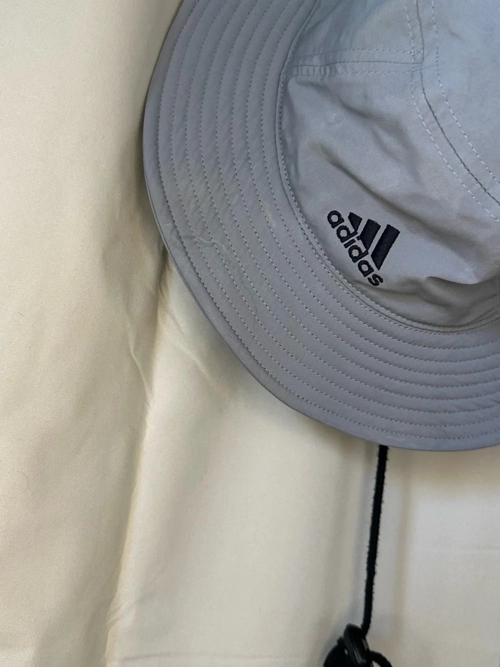adidas Victory Bucket Hat in grey.